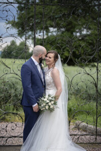 bride and groom in the stunning gardens of hoar Cross Hall