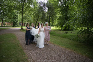 bride and bridal party arriving Hoar Cross Hall Wedding