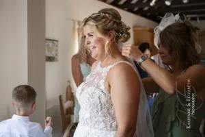 The finishing touches before the bride walks down the aisle at Blithfield Lakeside Barns.