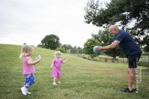 The children play in the stunning grounds at Blithfield Lakeside Barns in the morning of the wedding while the bride gets ready for her Big Day.