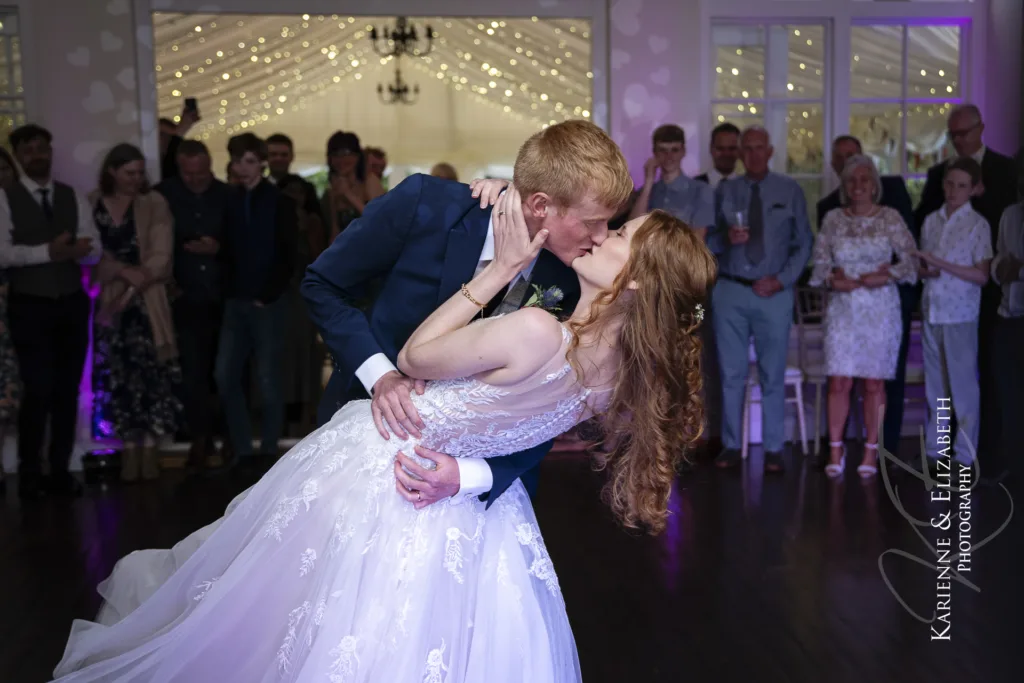 The happy couple open the dance floor with a breathtaking first dance in the evening of their relaxed wedding reception at Yeldersley Hall in Derbyshire.